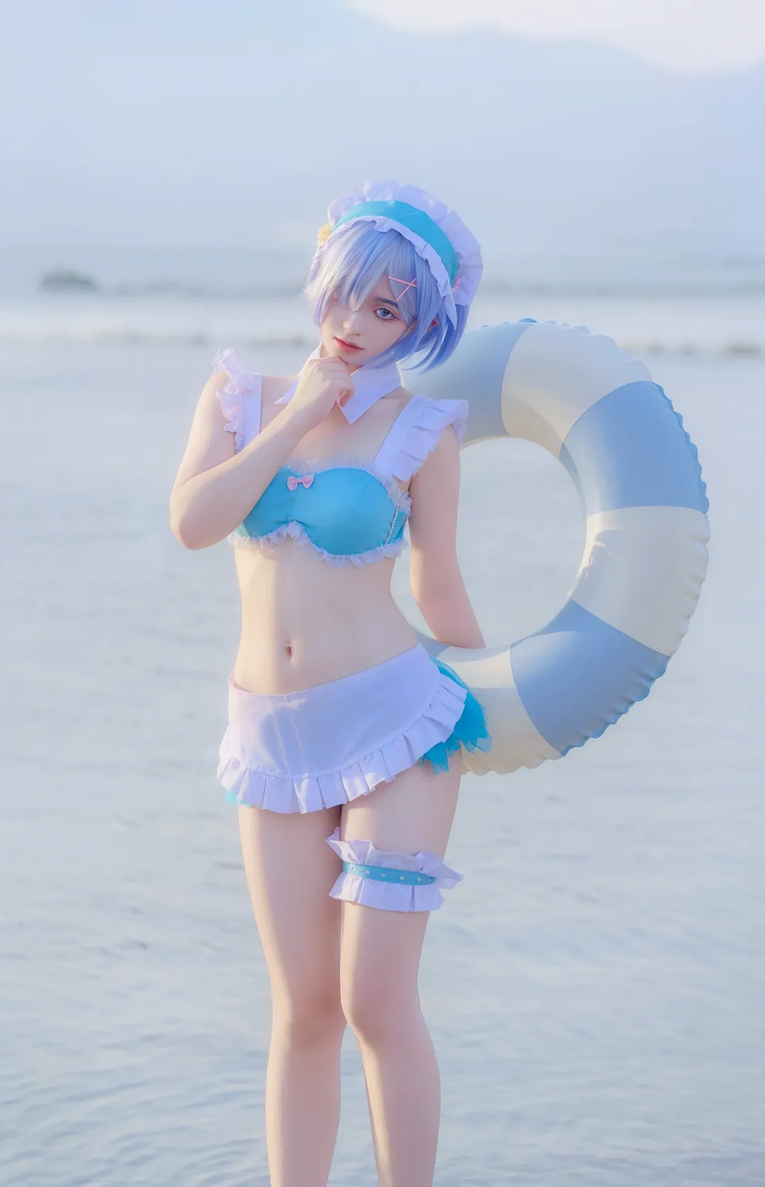 Anime-style photography, Rem cosplay, Seaside photoshoot, Blue and white outfit, Swimsuit outdoor photography - Image 1