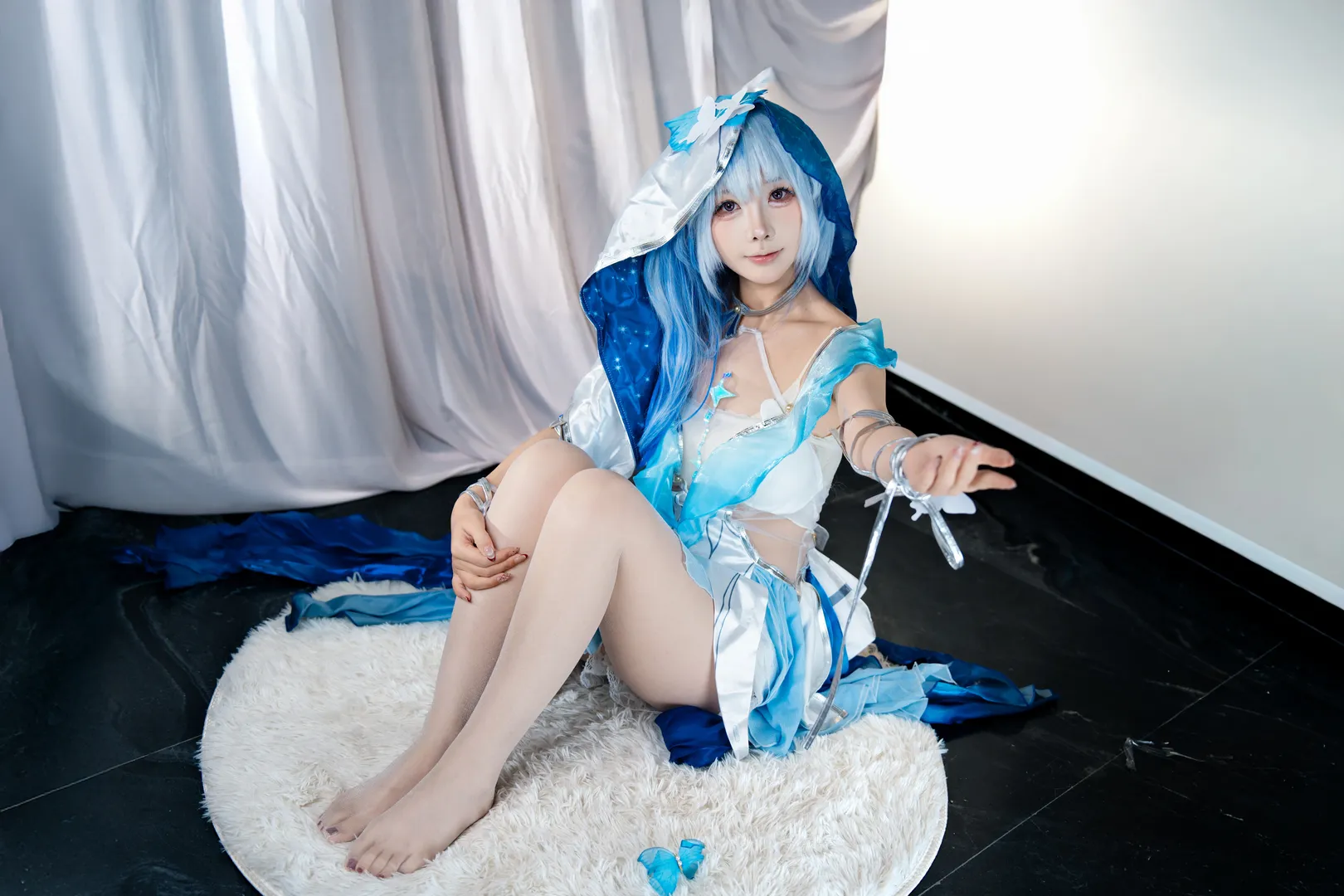 Anime-style photography, The Shorekeeper cosplay, Studio portrait, Blue and white ethereal outfit, Atmospheric styling - Image 2