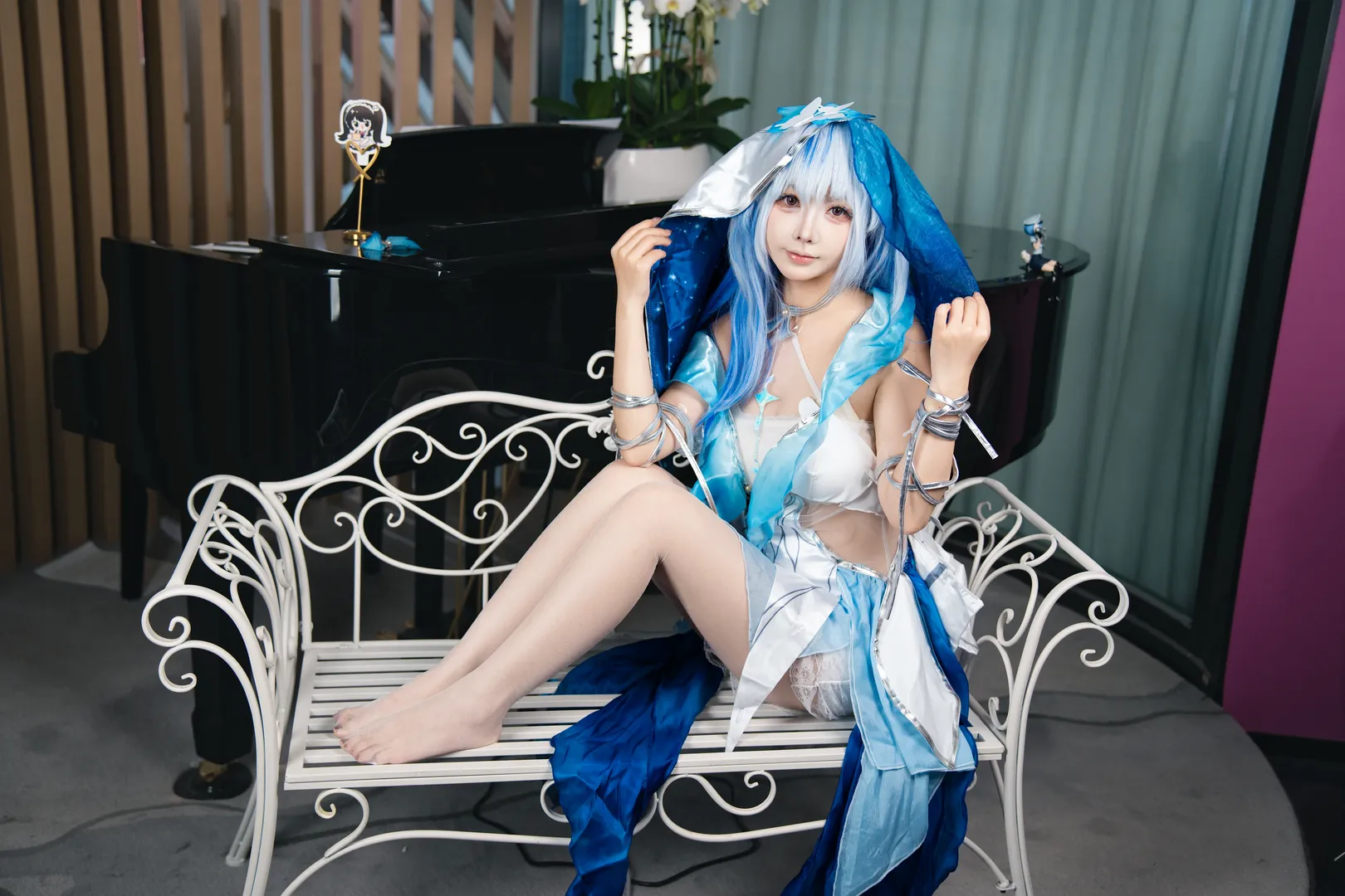 Anime-style photography, The Shorekeeper cosplay, Studio portrait, Blue and white ethereal outfit, Atmospheric styling