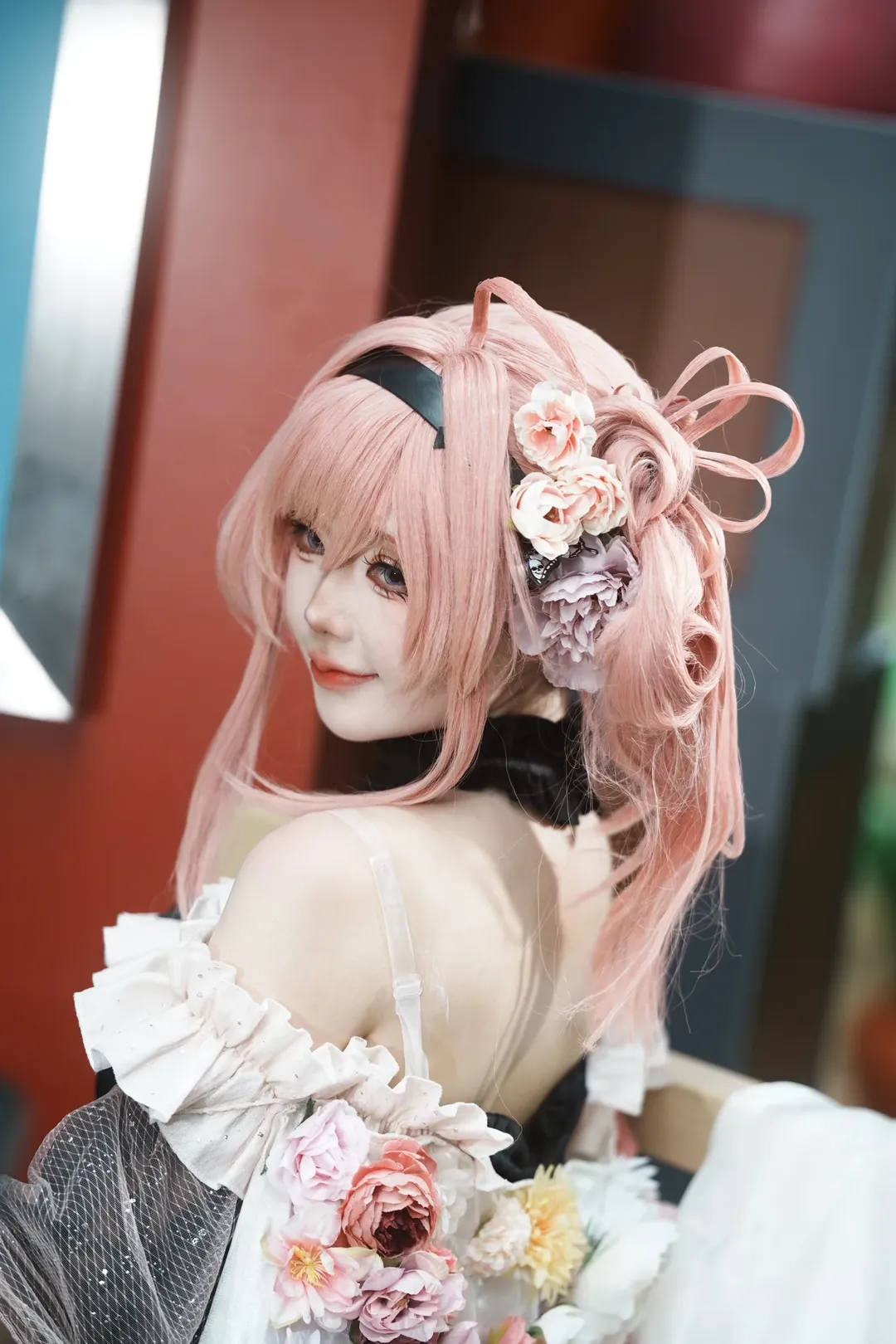 Pink hair cosplay, Cosplay sharing, Black and white ruffle outfit, Convention photo shoot, Silk flower accessories - Image 1