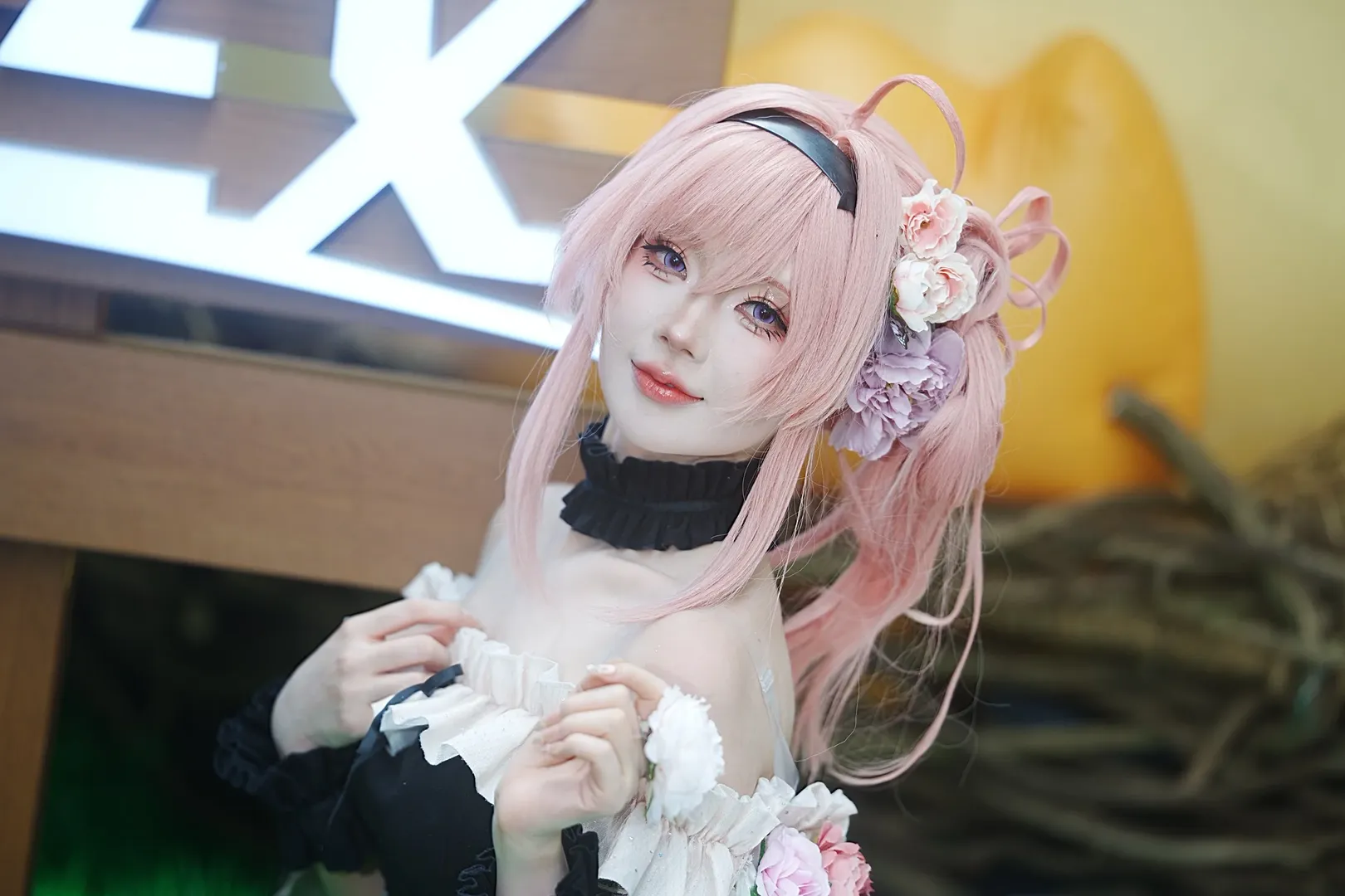 Pink hair cosplay, Cosplay sharing, Black and white ruffle outfit, Convention photo shoot, Silk flower accessories - Image 10