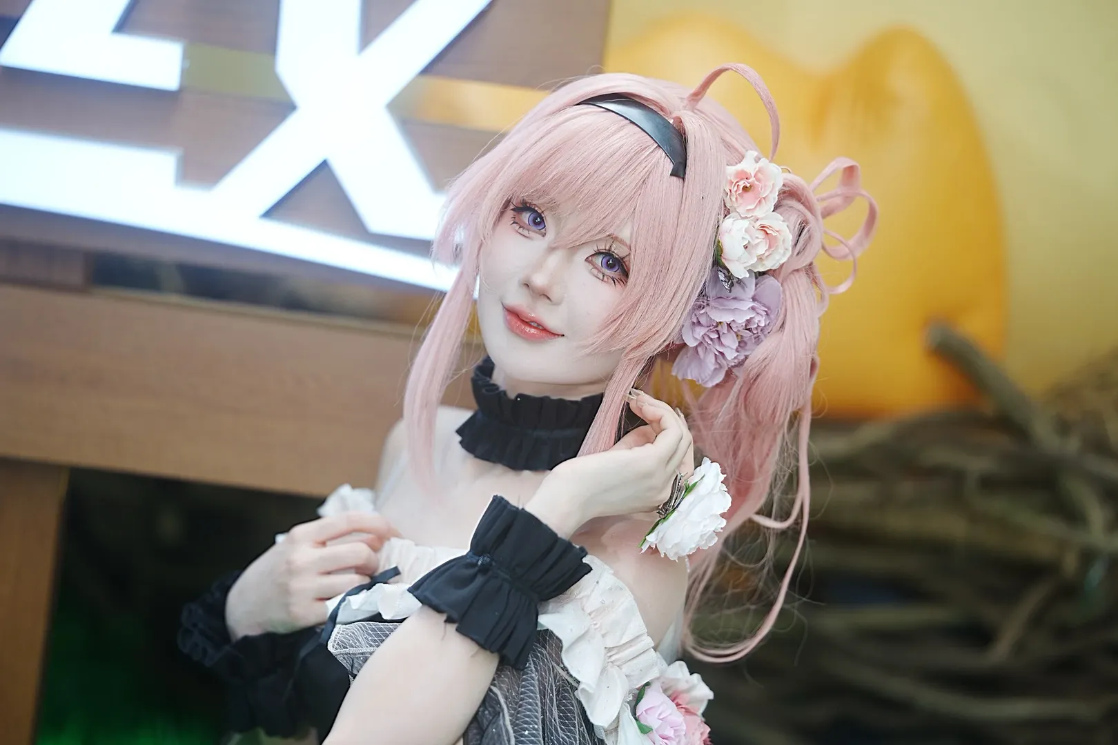 Pink hair cosplay, Cosplay sharing, Black and white ruffle outfit, Convention photo shoot, Silk flower accessories - Image 11