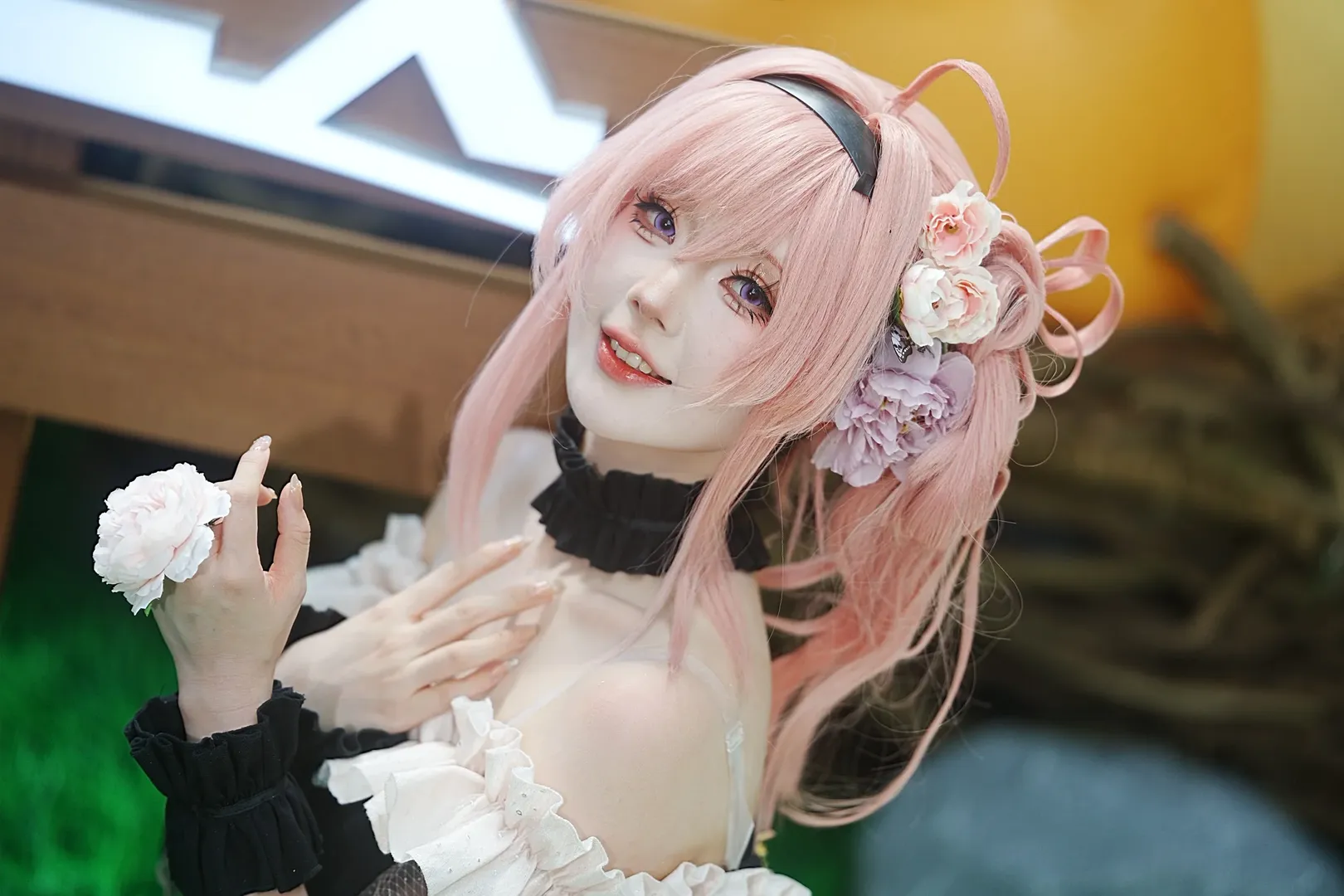 Pink hair cosplay, Cosplay sharing, Black and white ruffle outfit, Convention photo shoot, Silk flower accessories - Image 2