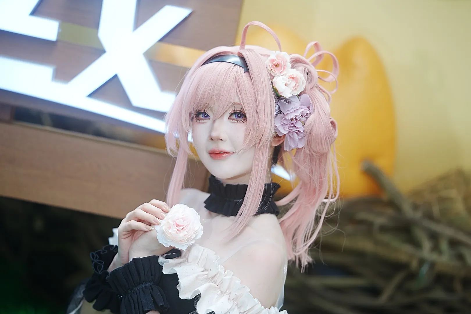 Pink hair cosplay, Cosplay sharing, Black and white ruffle outfit, Convention photo shoot, Silk flower accessories - Image 3