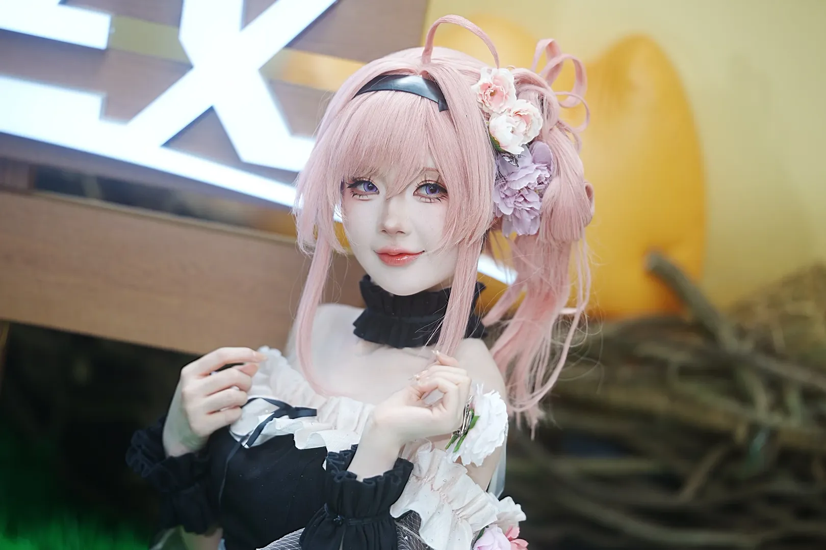 Pink hair cosplay, Cosplay sharing, Black and white ruffle outfit, Convention photo shoot, Silk flower accessories - Image 4