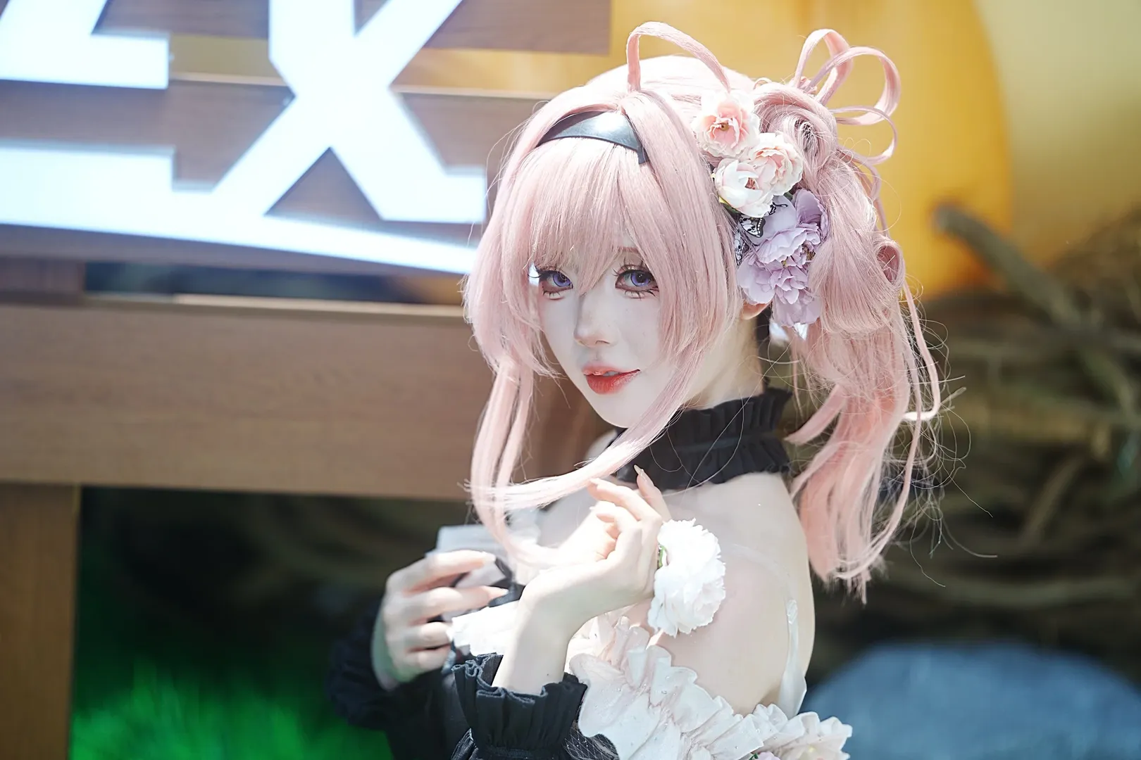 Pink hair cosplay, Cosplay sharing, Black and white ruffle outfit, Convention photo shoot, Silk flower accessories - Image 5