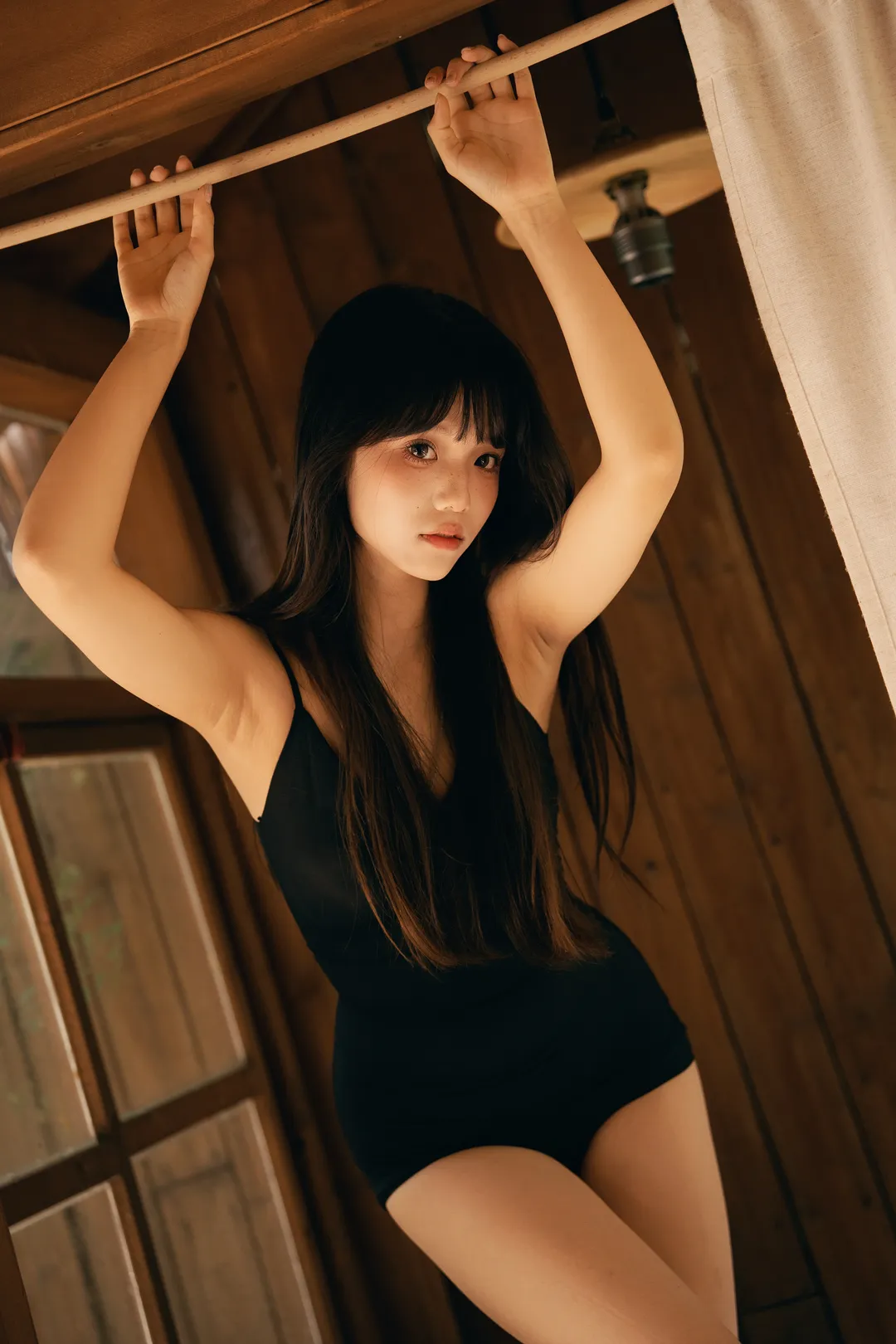 Maid supremacy cosplay, Wooden cabin ambiance, Rainy day photoshoot, Black-haired girl, Pure desire bodysuit