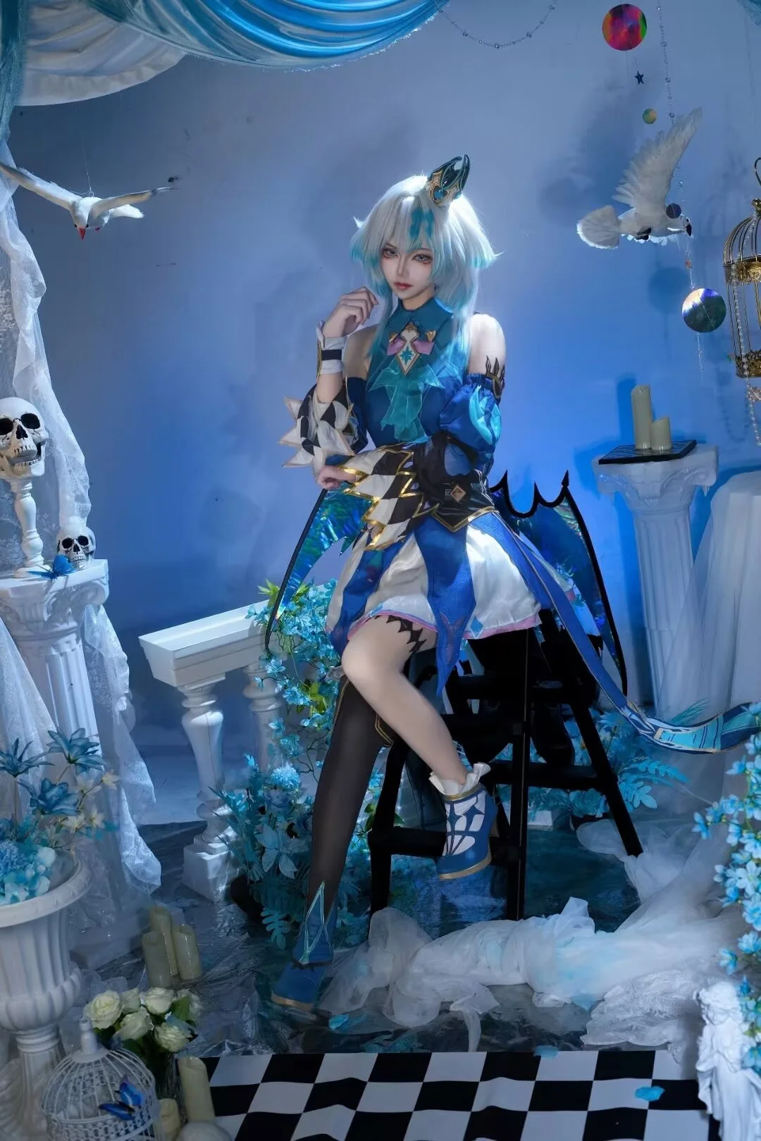 Blue and white color scheme, Studio photoshoot share, Fantasy style cosplay, Cool-toned photography, Props and set design