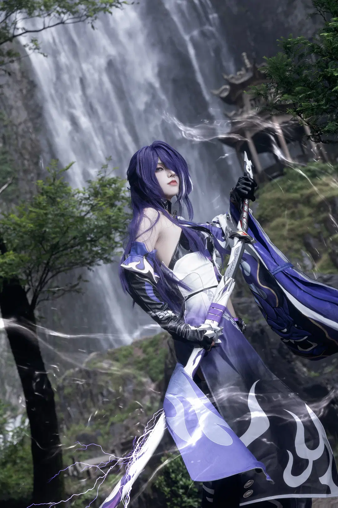 Purple-Haired Lightning Combat Cosplay Photoset: Battle Stances Beneath a Real Waterfall