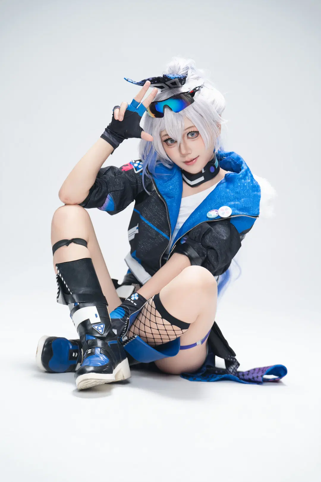 Blue and black outfit Techwear Set Paired with Fishnet stockings: A Combat-Ready Studio photography Archive by GG - Image 2