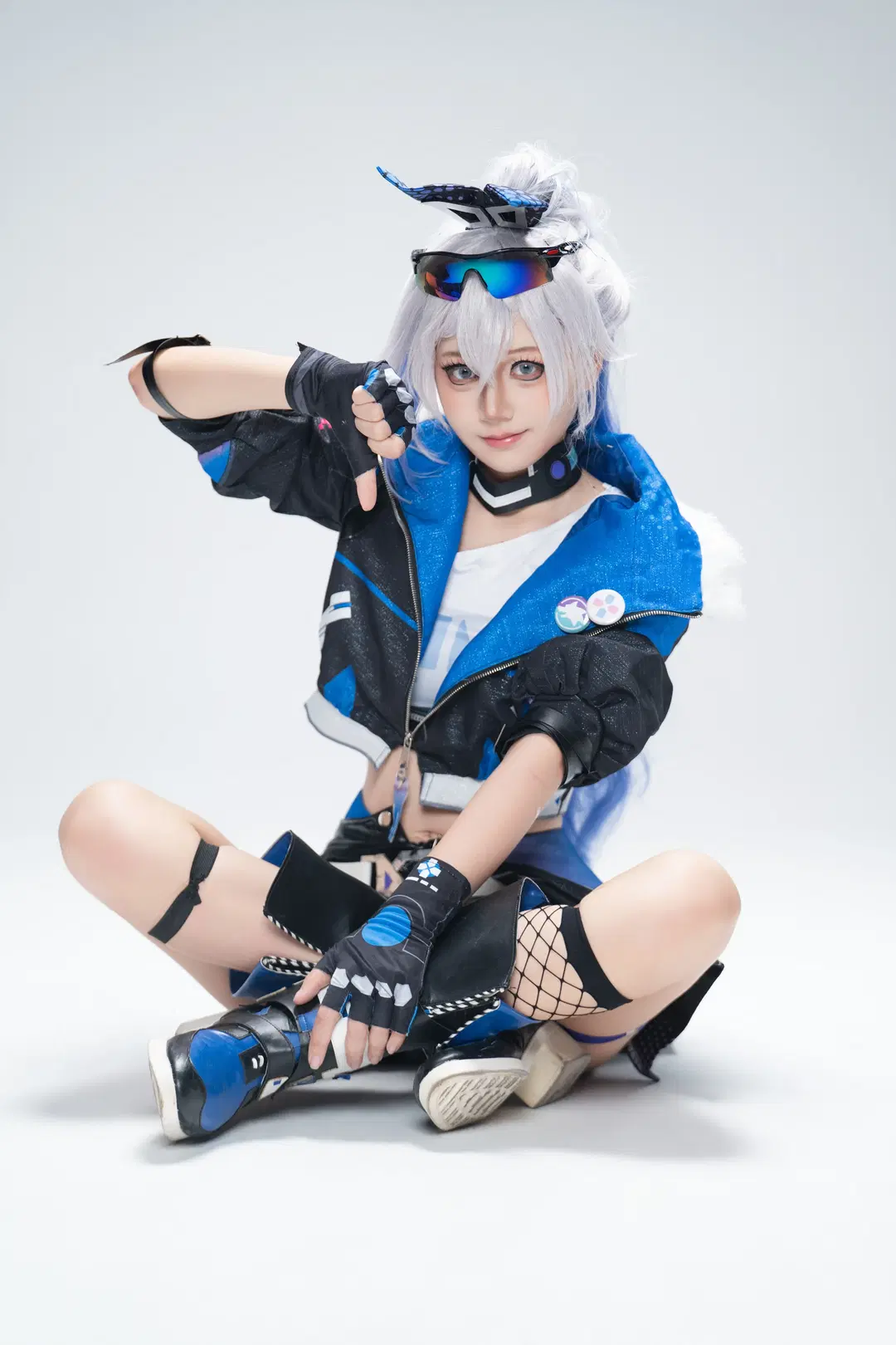 Blue and black outfit Techwear Set Paired with Fishnet stockings: A Combat-Ready Studio photography Archive by GG - Image 3