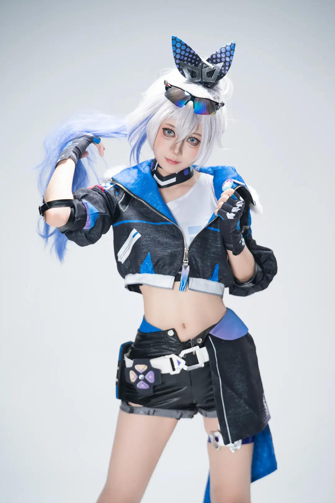 Blue and black outfit Techwear Set Paired with Fishnet stockings: A Combat-Ready Studio photography Archive by GG - Image 4