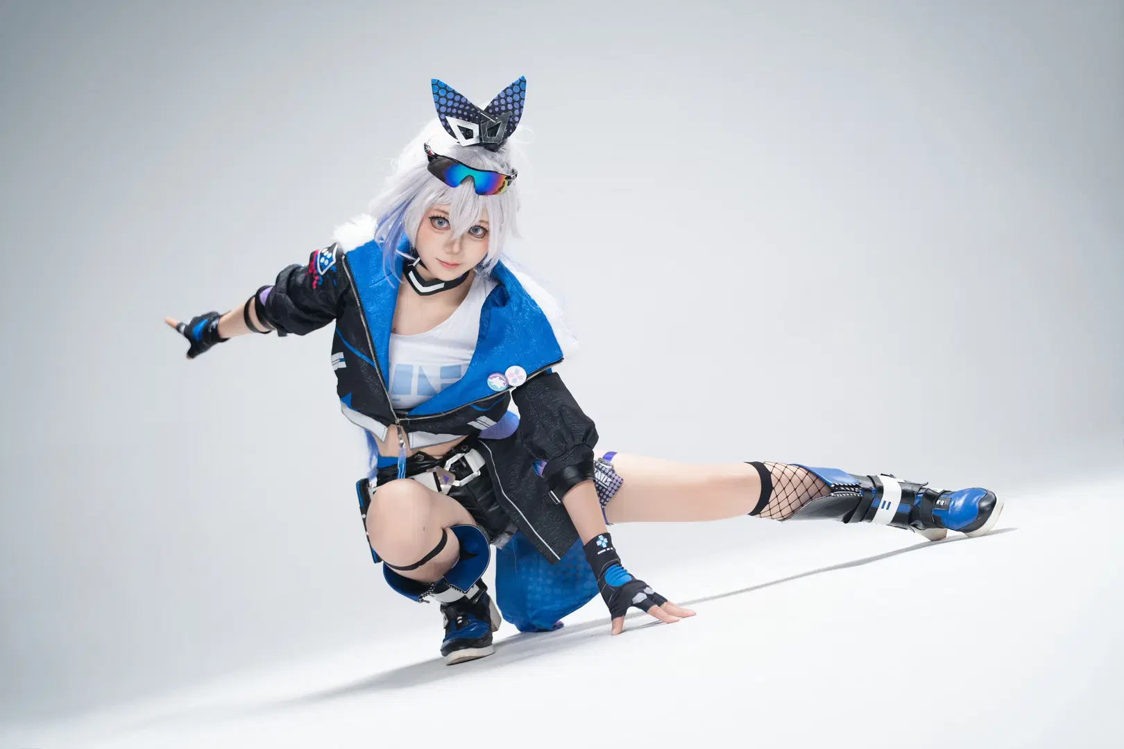 Blue and black outfit Techwear Set Paired with Fishnet stockings: A Combat-Ready Studio photography Archive by GG - Image 6